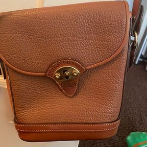 Dooney & Bourke all weather leather shoulder bag